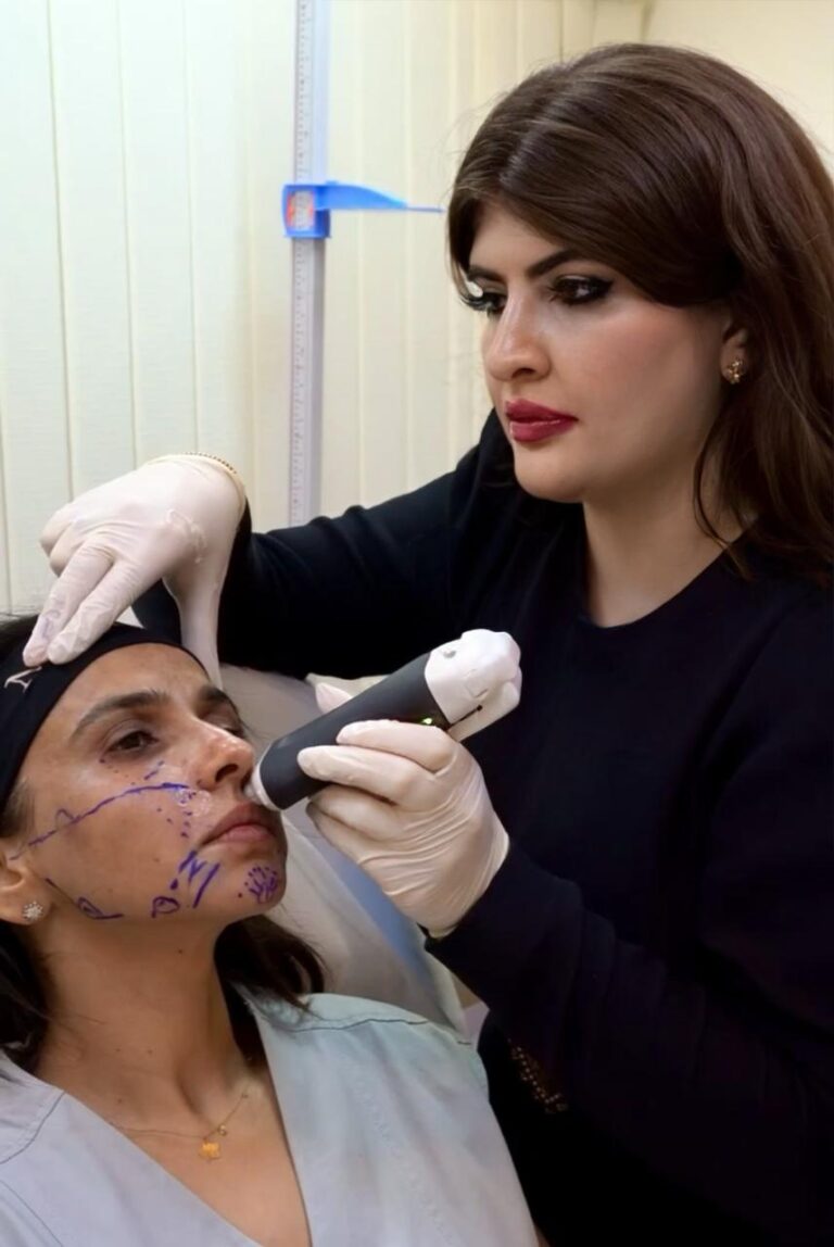 Dr. Shiva Faramarzi performing Clarius ultrasound vascular mapping before filler injection Dubai